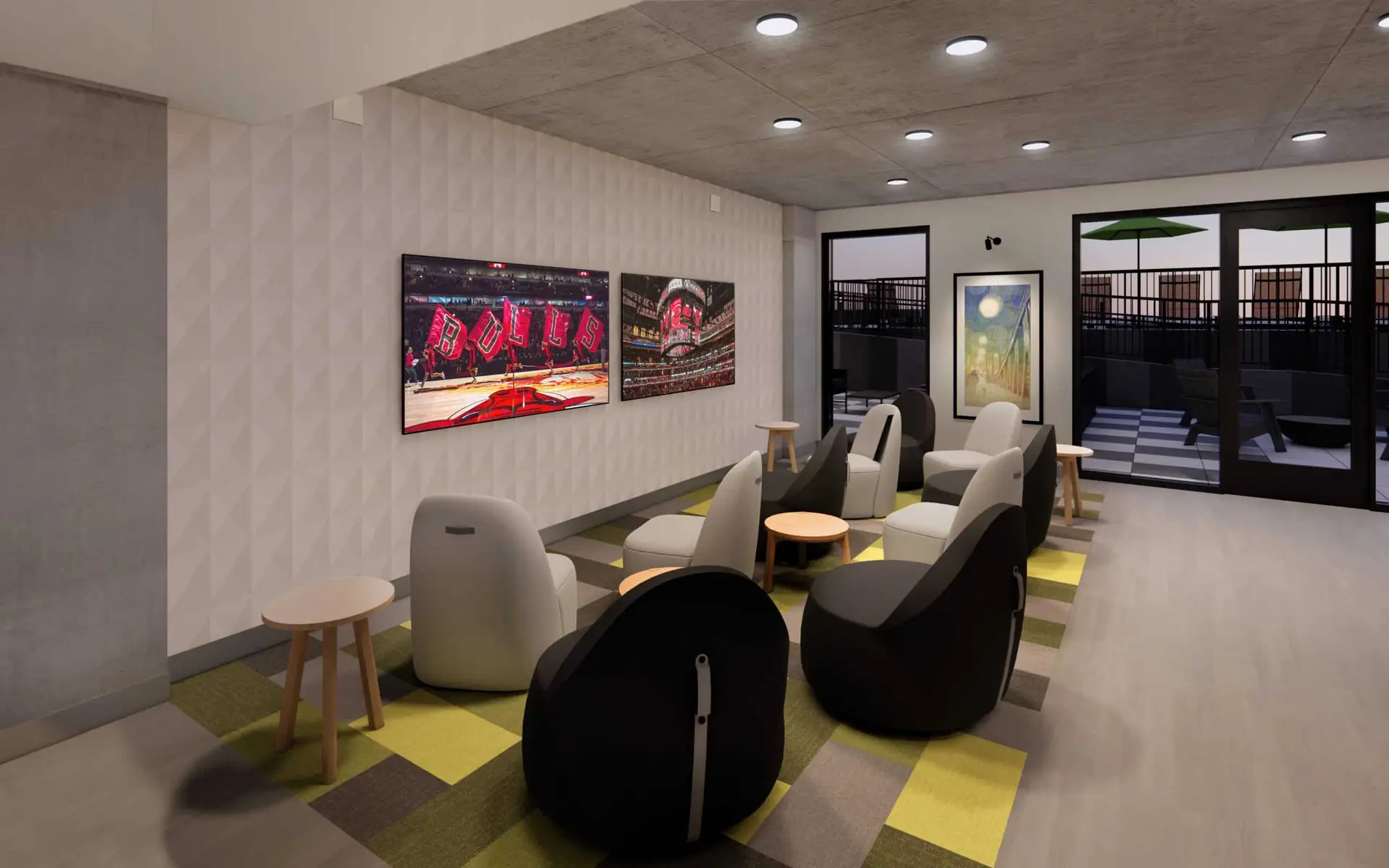 Media lounge with comfortable seating and large TV screens.