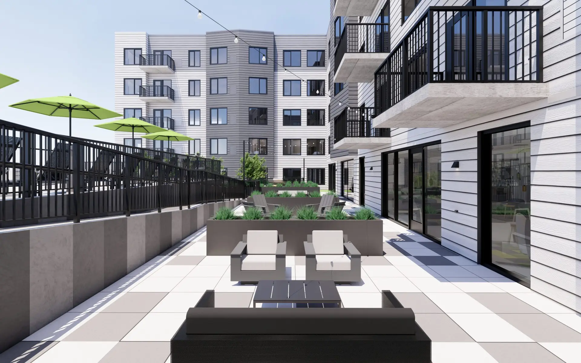 Terrace with seating, planters, and shaded umbrellas.